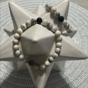His & Hers White and Black Beaded Bracelets